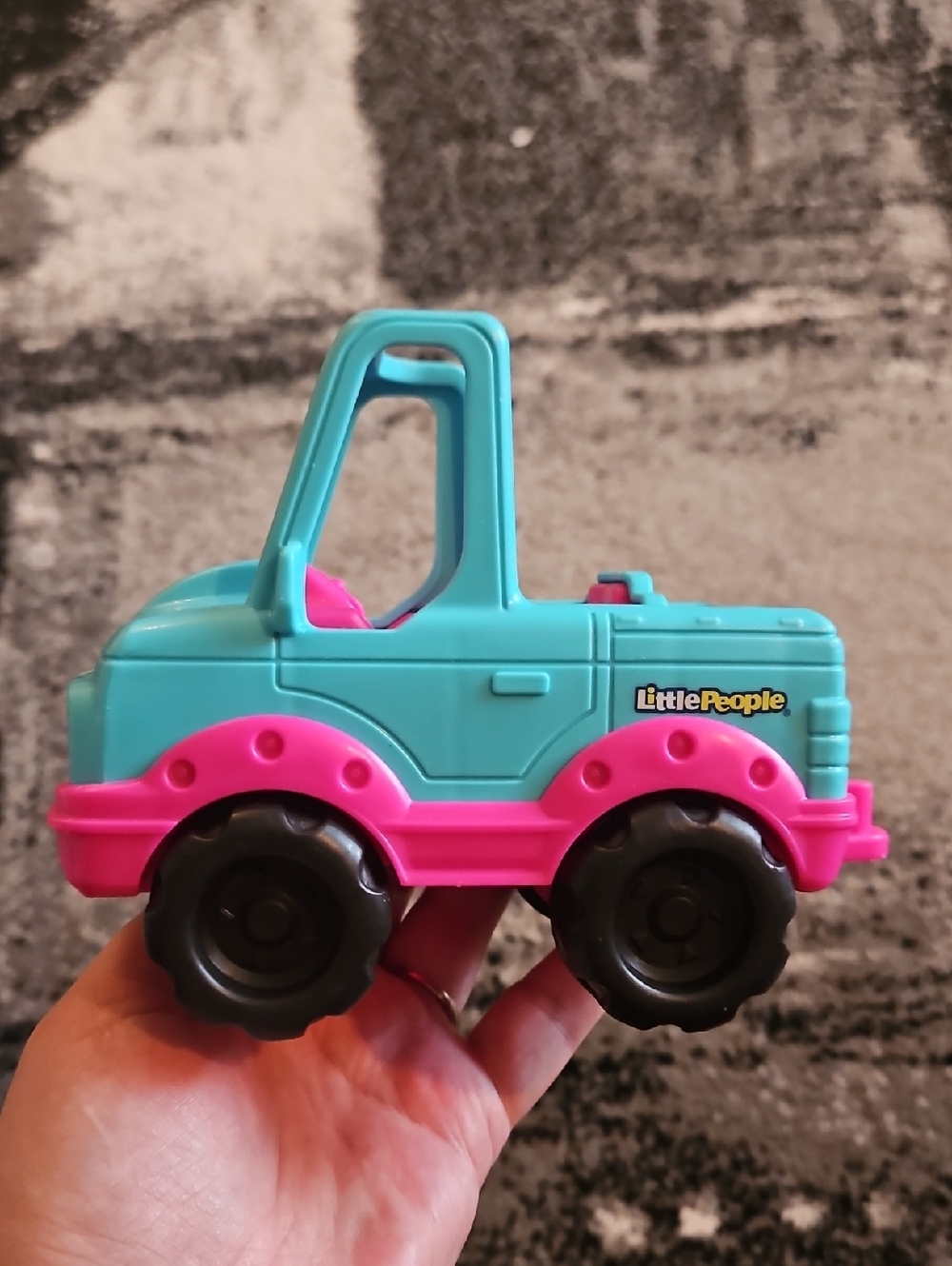 Fisher-Price Little People Barbie Truck toy.